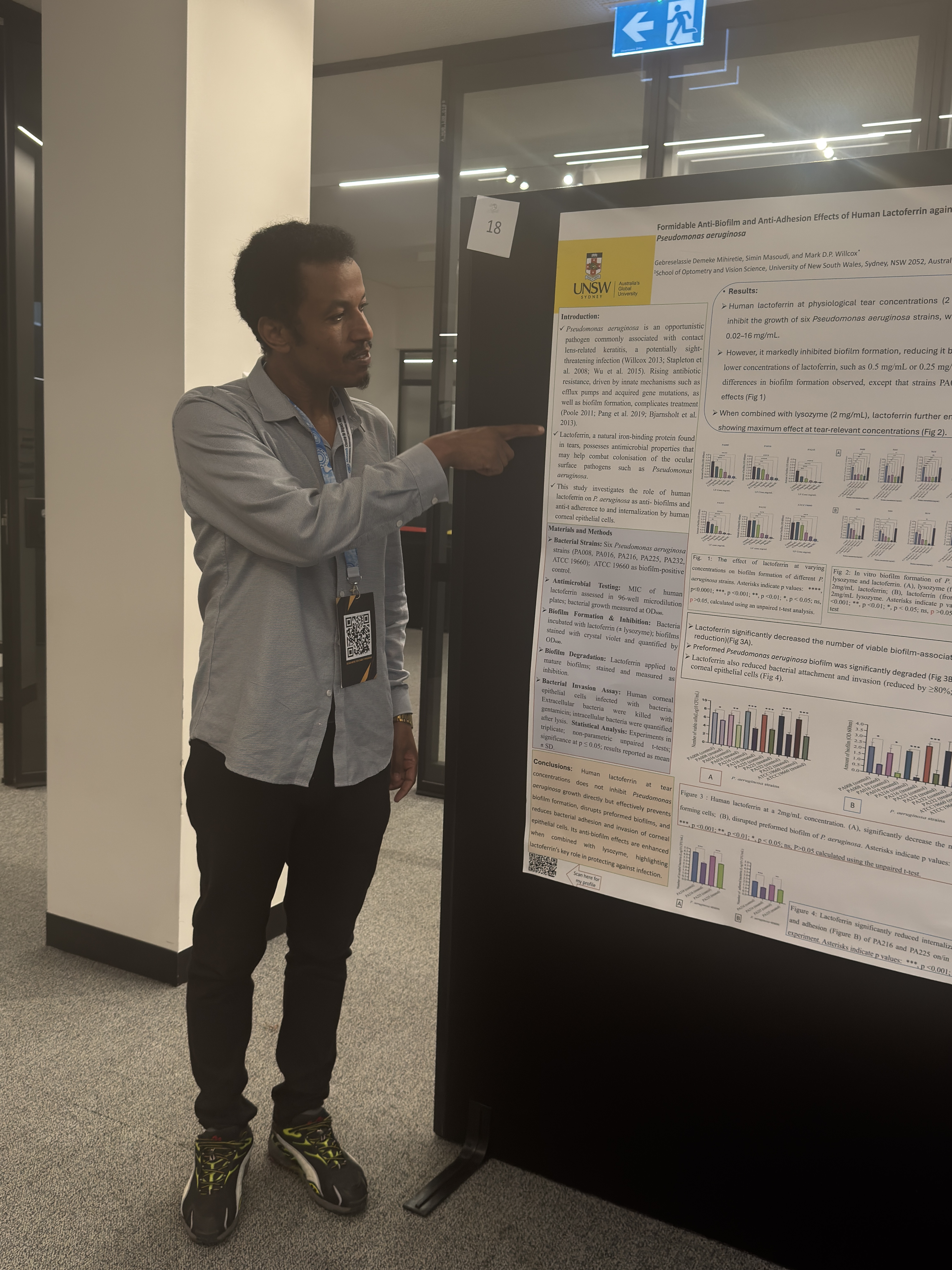 Gebreselassie Demeke Mihiretie with his conference poster
