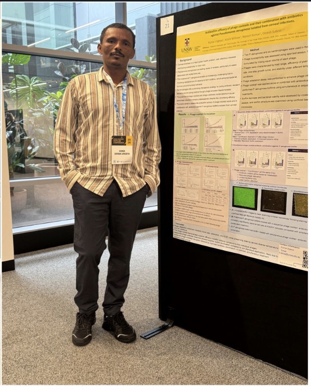 Kuma Urgeya Diriba with his conference poster