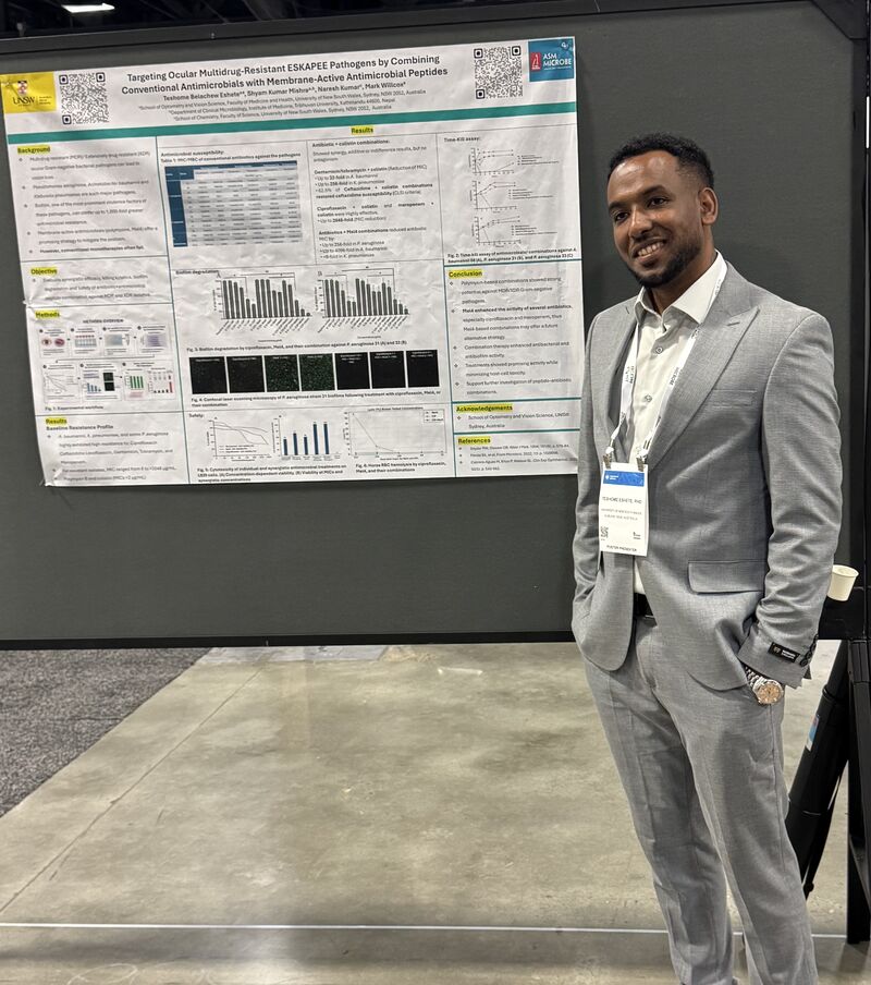 Teshome Belachew Eshete with his ASM Microbe 2026 poster